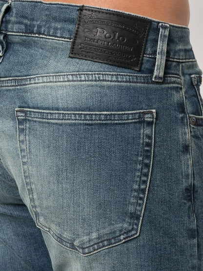 jeans slim com lavagem stonewashed